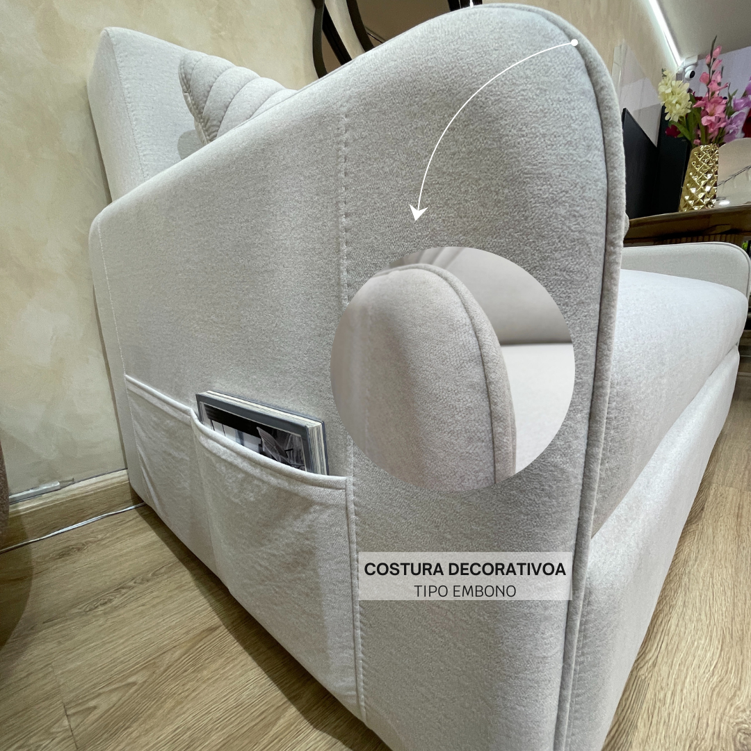Detalle de apoya brazos de sofa cama aleman con costura decorativa tipo embono